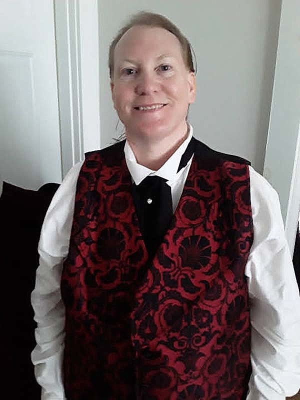 me in red and clack vest